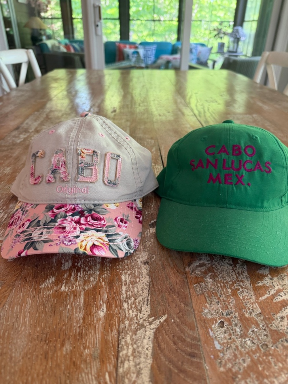 Two Cabo baseball caps